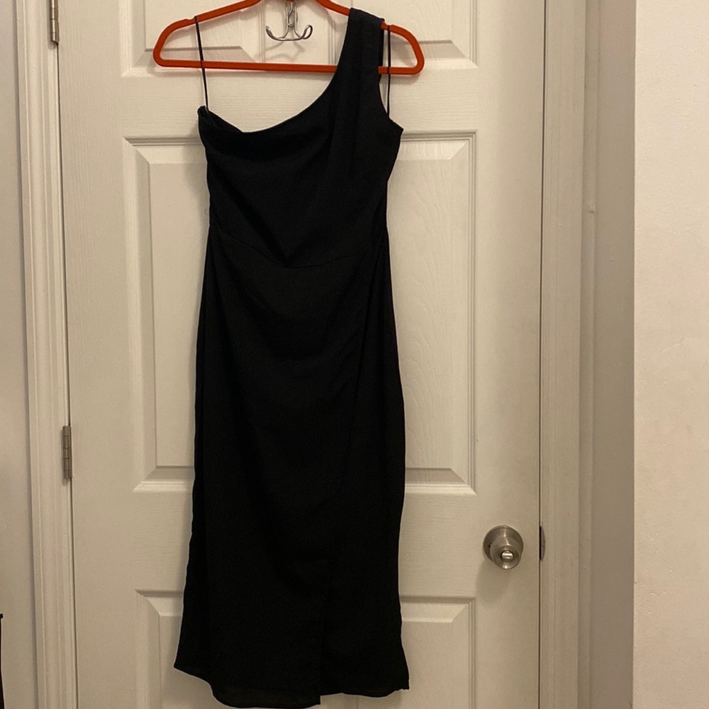 In the style one shoulder black dress with side zipper